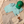 Flat lay Dogleg — tenue de golf verte et beige, style Swiss golf