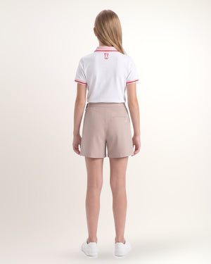 Polo Tour fille, blanc à col rose, porté de dos