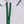 Polo de golf Dogleg Performance femme blanc et vert porté par une golfeuse — golf Suisse