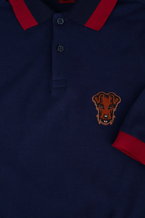 Polo de golf Dogleg Stella navy porté par un golfeur — coupe technique, golf Suisse
