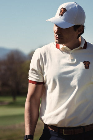 Stella Polo Homme Dogleg — Crème, en situation sur le parcours
