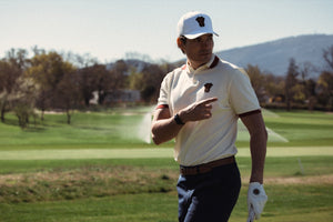 Stella Polo Homme Dogleg — Crème, en situation sur le parcours