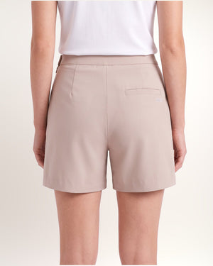 Skort femme, beige, dos et poche passepoilée en détail